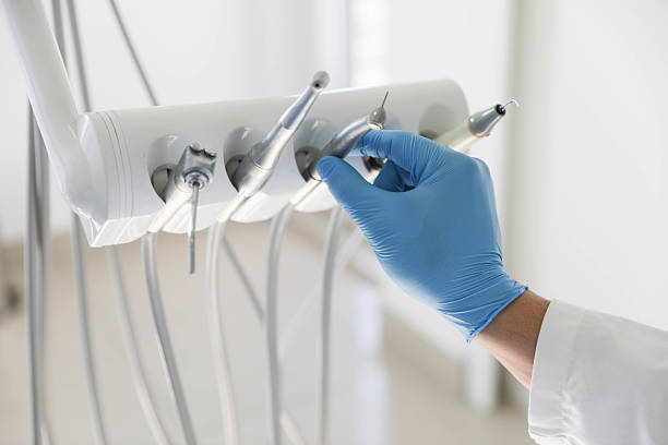 Professional Tooth Extraction technician working in Webster, FL